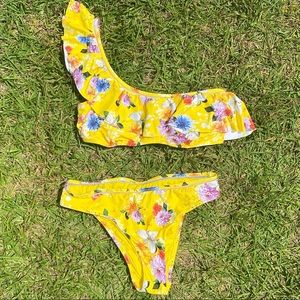 Yellow floral Nanette Lepore off the shoulder bikini size medium with padding.